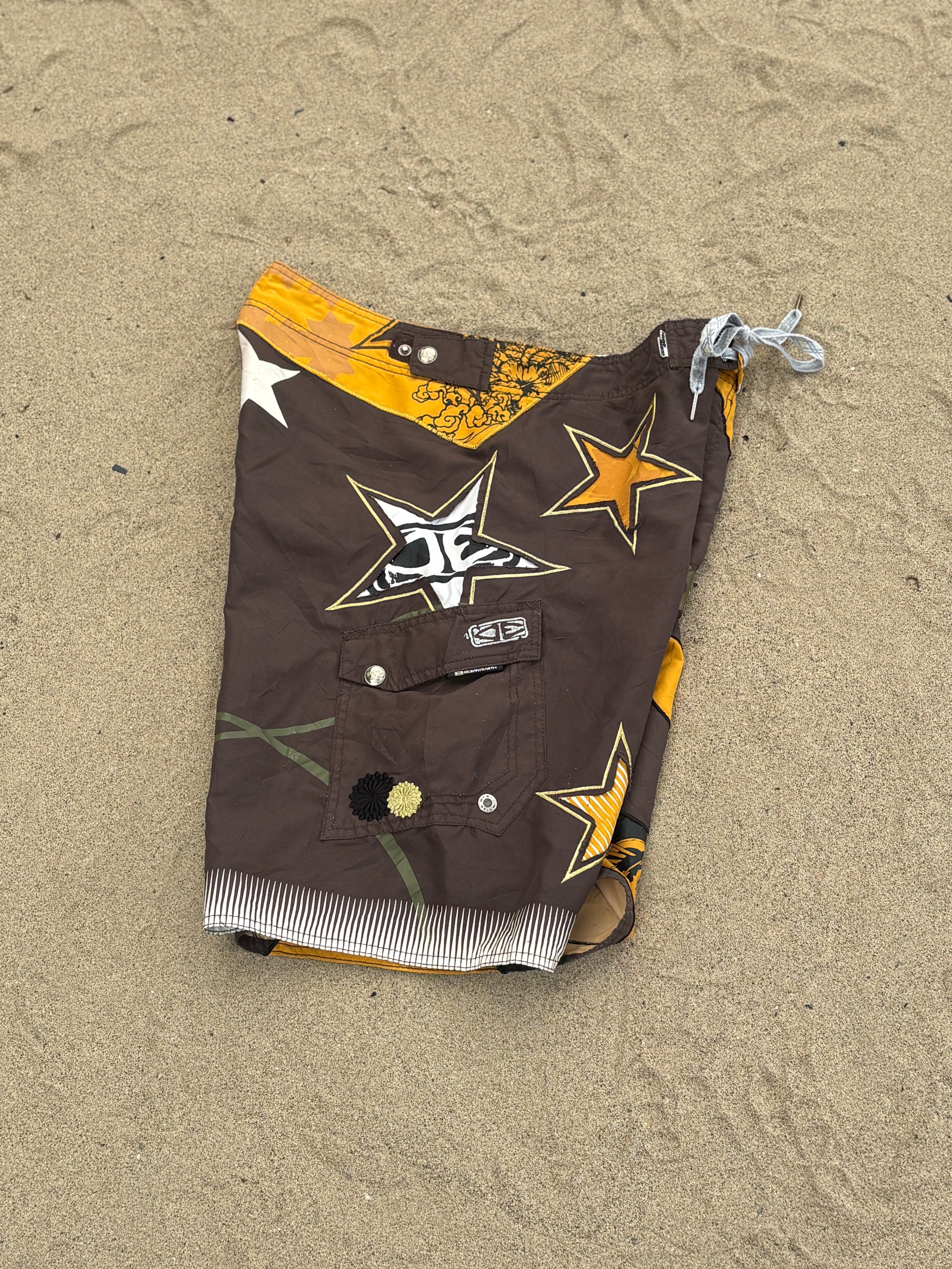 Ocean Earth Rising Sun board shorts L
